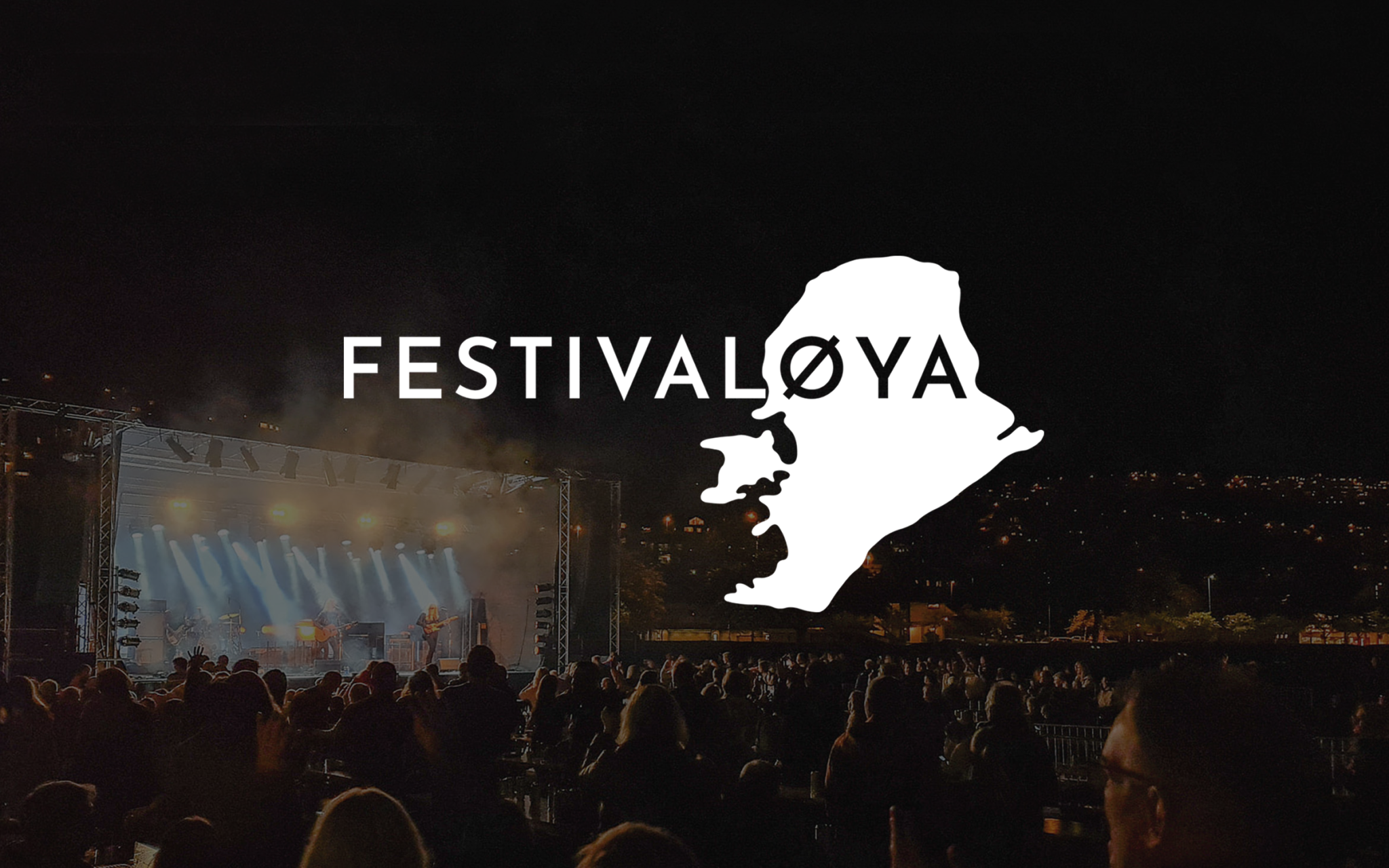 logo til Festivaløya i hvitt på mørk bakgrunn