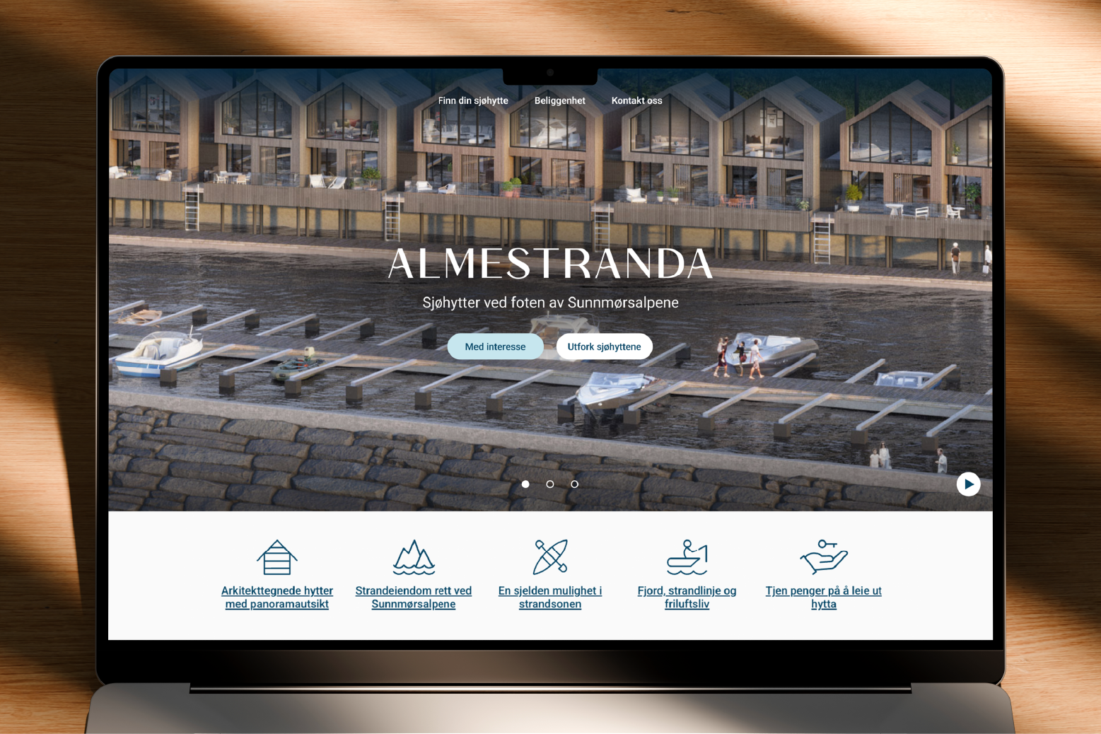 Mockup av en laptop som viser webdesign for hytteprosjekt